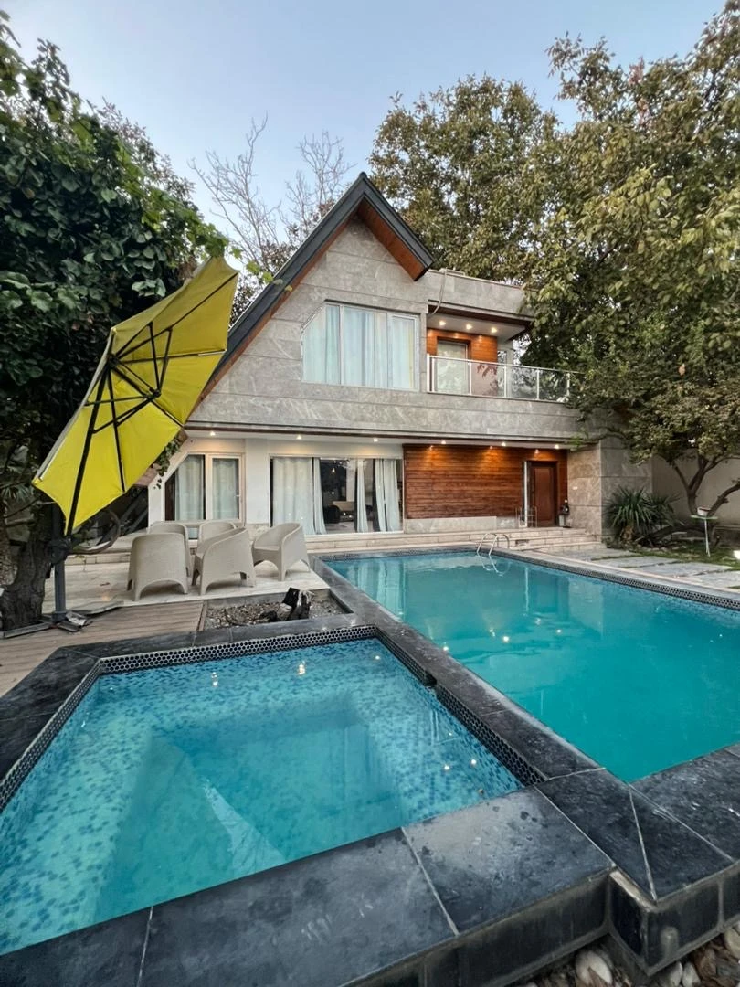 باغ ویلا سوئیسی کرال با استخر چهارفصل در شهریار