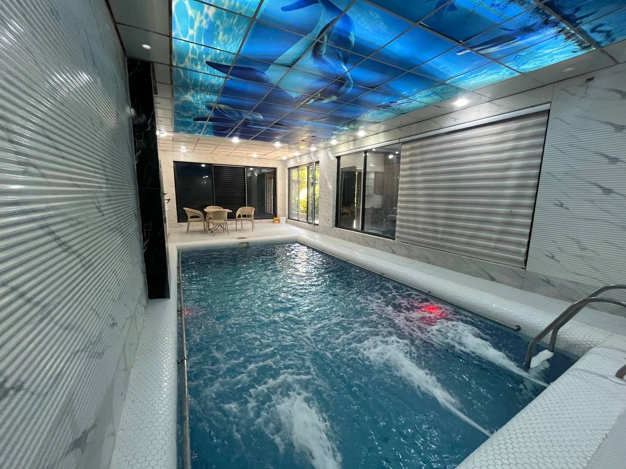 باغ ویلا آیهان - ترکیب بازی و آرامش در ویلای تضمینی بومچه